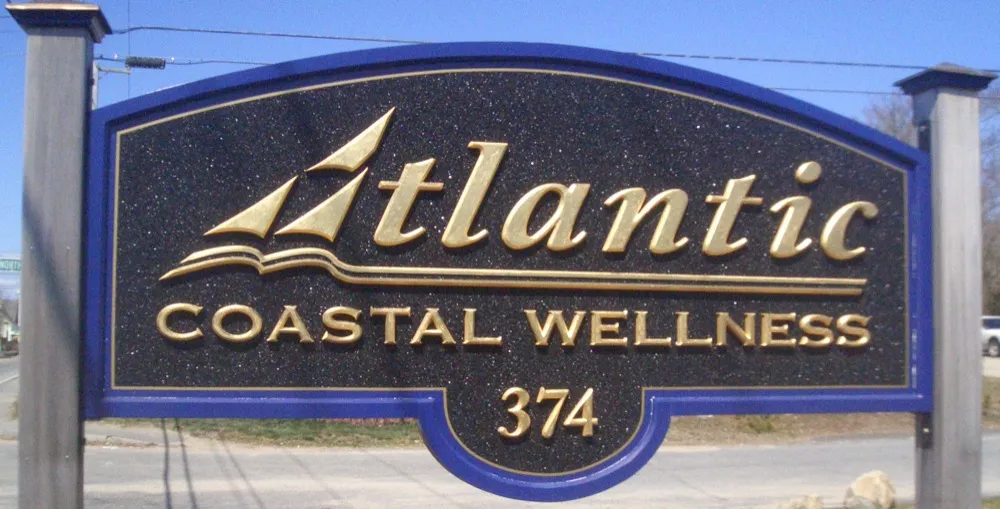 The Atlantic Coastal Wellness sign at 374 West Main Street